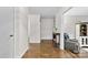 This hallway is naturally lit and showcases the gorgeous flooring throughout the home at 1081 Long Dr, Newton, NC 28658