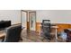 Bright office space with hardwood floors, desk, and modern chair, perfect for a home office setup at 1081 Long Dr, Newton, NC 28658