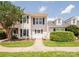 Charming townhome with manicured lawn, walkway, and inviting curb appeal at 10945 Winterbourne Ct, Charlotte, NC 28277