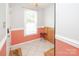 Inviting foyer with tiled flooring, natural light, and access to stairs at 10945 Winterbourne Ct, Charlotte, NC 28277