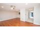 Inviting living room with hardwood floors, neutral paint, and recessed lighting at 10945 Winterbourne Ct, Charlotte, NC 28277