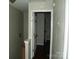 A home hallway featuring neutral paint, trim detail and doors leading to the other rooms at 11107 Lions Mane St, Charlotte, NC 28273
