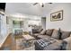 Comfortable living room flows into the dining area, with a view of the kitchen at 124 Cedarcroft Dr, Mooresville, NC 28115