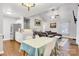 Open concept living space integrates the kitchen, dining area, and living room for easy living at 124 Cedarcroft Dr, Mooresville, NC 28115
