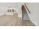 Open concept living space with hardwood floors and a kitchen view at 124 Utility Ln # E, Mooresville, NC 28117