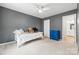 Neutral bedroom featuring carpet, twin bed, ceiling fan, and view into the bathroom at 12637 Belmont Mansion Dr, Charlotte, NC 28273
