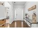 Welcoming entryway with hardwood floors, ample natural light, and stylish decor at 12637 Belmont Mansion Dr, Charlotte, NC 28273