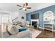 Inviting living room with a cozy fireplace, comfortable seating, and stylish accents at 12637 Belmont Mansion Dr, Charlotte, NC 28273