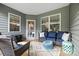 Inviting porch with comfortable seating, stylish rug, and natural light, perfect for relaxing and entertaining at 12637 Belmont Mansion Dr, Charlotte, NC 28273