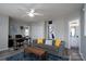 Open living area with comfortable seating and natural light at 12719 Walking Stick Dr, Charlotte, NC 28278