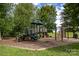 Fun-filled community playground with slides, climbing structures, and safe, cushioned ground at 12719 Walking Stick Dr, Charlotte, NC 28278