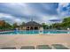 Enjoy a refreshing swim in this spacious community pool with ample lounging area at 12719 Walking Stick Dr, Charlotte, NC 28278