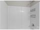 Shower with white walls and stainless steel caddies at 128 Locomotive Ln, Mooresville, NC 28115