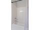 This well-maintained shower includes a tub with a white shower surround and a shower head at 128 Locomotive Ln, Mooresville, NC 28115