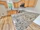 Bright kitchen with stainless steel appliances, granite countertops, and natural wood cabinets at 1657 Diary Dr, Rock Hill, SC 29730