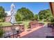 Spacious back deck area with lush green backyard and mature trees at 2078 Valley View Ln, Lincolnton, NC 28092
