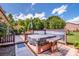 Backyard with a covered hot tub, patio, and scenic greenery at 2078 Valley View Ln, Lincolnton, NC 28092