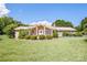 Charming brick home with a well-manicured lawn and mature landscaping at 2078 Valley View Ln, Lincolnton, NC 28092