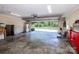 Spacious two car garage with workbench and door leading to outdoor space and backyard at 2078 Valley View Ln, Lincolnton, NC 28092