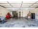 Spacious two-car garage with ample storage space and brick wall accents at 2078 Valley View Ln, Lincolnton, NC 28092