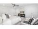 Comfortable bedroom featuring art, carpet, modern furniture, and a ceiling fan at 2313 Stallings Rd, Harrisburg, NC 28075