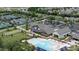 Aerial view of community clubhouse, pool, tennis courts, and well-manicured landscaping at 238 Cherrytree Dr, Fort Mill, SC 29715