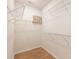 Walk-in closet has white wire shelving and wood floor at 238 Cherrytree Dr, Fort Mill, SC 29715