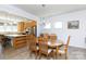 Dining room next to an open kitchen with stainless steel appliances at 238 Cherrytree Dr, Fort Mill, SC 29715