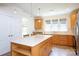 Island kitchen boasts stainless steel appliances and quartz countertops at 238 Cherrytree Dr, Fort Mill, SC 29715