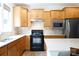 Kitchen includes updated appliances and hardwood floors at 238 Cherrytree Dr, Fort Mill, SC 29715