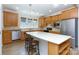 Kitchen with island, stainless appliances, and quartz countertops at 238 Cherrytree Dr, Fort Mill, SC 29715