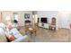 Bright and airy living room with hardwood floors at 238 Cherrytree Dr, Fort Mill, SC 29715