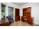 Office space with built-in wood shelving, desk, and chair at 238 Cherrytree Dr, Fort Mill, SC 29715