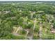 Scenic aerial view of a neighborhood with mature trees and well-maintained houses at 2418 Live Oak Ct, Gastonia, NC 28056