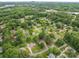Aerial view of a residential neighborhood with mature trees and well-maintained homes at 2418 Live Oak Ct, Gastonia, NC 28056