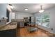 Contemporary kitchen with stainless appliances, granite counters, and a view into the living area at 2418 Live Oak Ct, Gastonia, NC 28056
