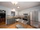 Bright kitchen with stainless steel appliances, granite countertops, and a functional center island at 2418 Live Oak Ct, Gastonia, NC 28056