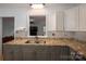 Granite countertops and stainless steel appliances in a well-lit kitchen, offering functionality and style at 2418 Live Oak Ct, Gastonia, NC 28056