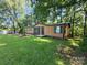 Quaint single story home featuring a well-maintained lawn with mature trees at 2461 Ridgecrest Dr, Stanley, NC 28164