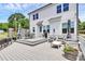 Inviting back deck with dining and seating areas, perfect for outdoor entertaining at 2600 Palm Ave, Charlotte, NC 28205