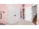 Bedroom featuring neutral carpet, large closets, and built in shelves at 2600 Palm Ave, Charlotte, NC 28205