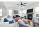 Cozy living room with a fireplace, large windows, and stylish furnishings for relaxation and gatherings, hardwood floors at 2600 Palm Ave, Charlotte, NC 28205