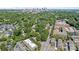 An aerial view of the residential area showcasing lush greenery, cityscape, and local amenities at 2625 E 5Th St # F, Charlotte, NC 28204