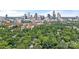 A scenic view of the city skyline as seen through a canopy of trees at 2625 E 5Th St # F, Charlotte, NC 28204