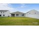 A view of the backyard with a well manicured lawn and white fence at 2656 Goose Fair Rd # 126, Maiden, NC 28650