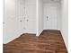 Bright entryway with hardwood floors, multiple doors, and crisp white trim throughout the space at 2656 Goose Fair Rd # 126, Maiden, NC 28650