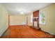 Inviting living room features hardwood floors, a brick fireplace, and bright windows, creating a warm ambiance at 2722 Catawba Church Rd, Rock Hill, SC 29730