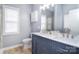 Modern bathroom with dual sink vanity and white countertop offers ample space at 2836 Rosemeade Dr, Monroe, NC 28110