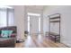 Inviting entryway with a coat rack, hardwood floors, and a view of the front door with sidelights at 2836 Rosemeade Dr, Monroe, NC 28110