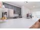 Modern kitchen features stainless steel appliances, gray cabinets, and a large white quartz countertop at 2836 Rosemeade Dr, Monroe, NC 28110